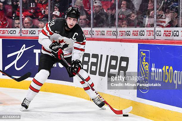 Dylan Strome of Team Canada looks to play the puck during the 2017 IIHF World Junior Championship quarterfinal game against Team Czech Republic at...