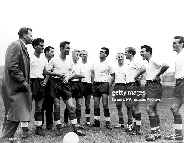 England players at training before the match against Sweden: manager Walter Winterbottom, Ron Clayton, trainer Harold Shepherdson, Brian Clough, Tony...