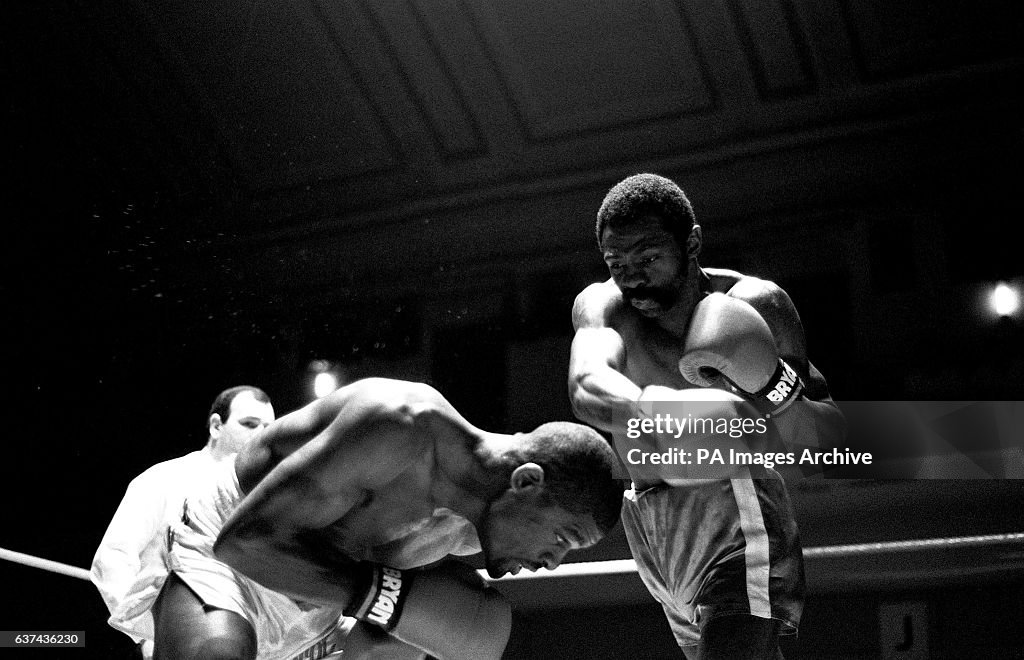 James Cook Boxer Errol Christie ducks as James Cook throws a right News Photo - Getty Images