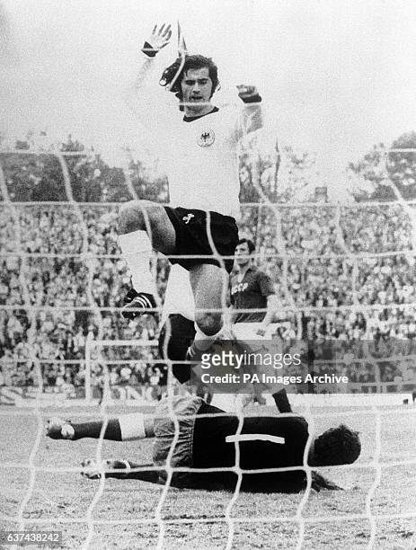West Germany's Gerd Muller leaps over USSR goalkeeper Yevgen Rudakov after touching home his team's third goal