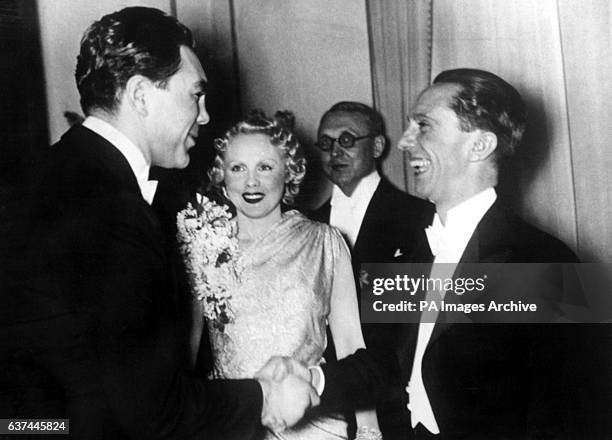 Former World Heavyweight Champion Max Schmeling shakes hands with Nazi Propaganda Minister Joseph Goebbels at a reception thrown by Dr Goebbels in...