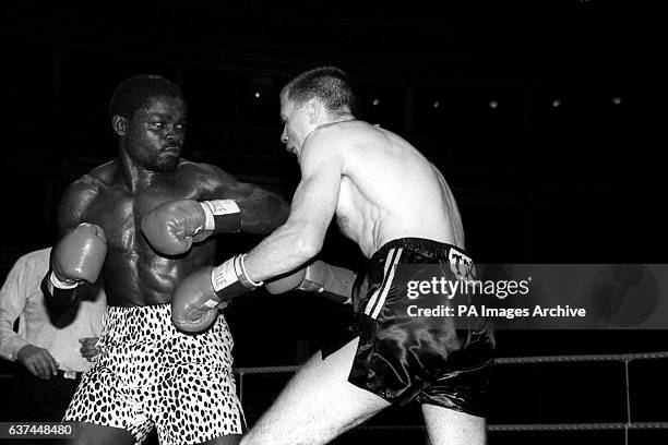 Challenger Jim McDonnell lets his guard drop as Azumah Nelson unleashes a combination