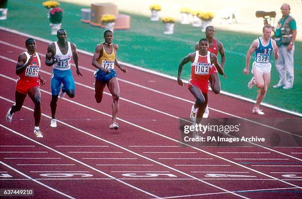 S Joe DeLoach comes home to win gold ahead of USA's Carl Lewis , Brazil's Robson da Silva , Great Britain's Linford Christie , Canada's Atlee Mahorn...