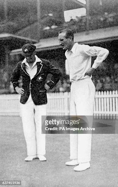 The two captains, Australia's Bill Woodfull and England's Douglas Jardine , at the coin toss, which Woodfull won