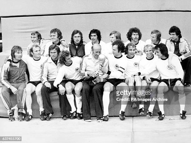 West Germany celebrate with the World Cup after their 2-1 victory: Horst Hottges, Sepp Maier, Heinz Flohe, Gerd Muller, Jurgen Grabowski, Paul...