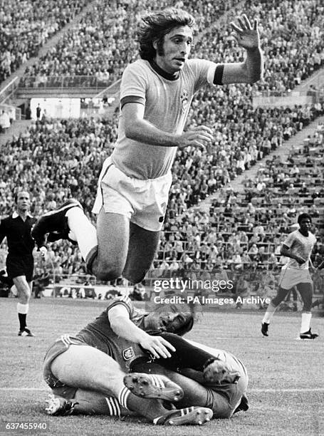 Brazil's Mario Marinho flies over Poland's Andrzej Szarmach and goalkeeper Jan Tomaszewski