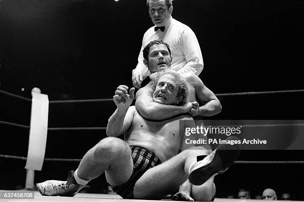 France's Vic Corne holds England's Jackie Pallo in a headlock