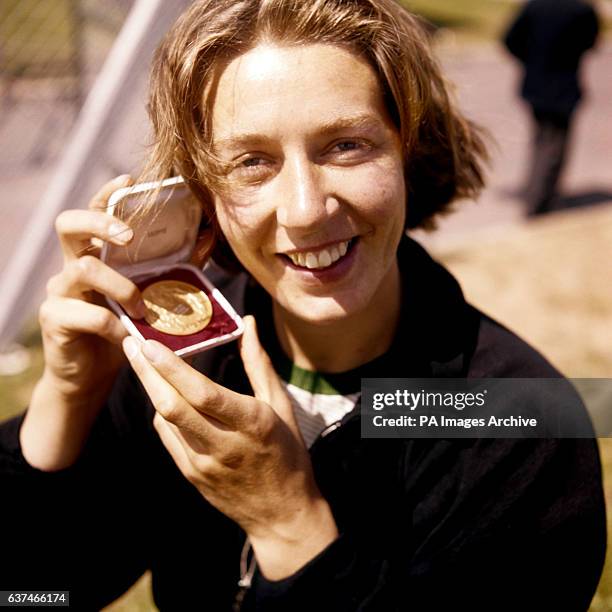 Shot put winner New Zealand's Valerie Sloper with her medal.
