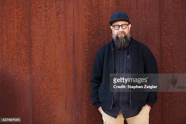 portrait of bearded man - metalic jacket stock pictures, royalty-free photos & images