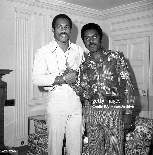 American boxer Ken Norton with Muhammad Ali's PR man .