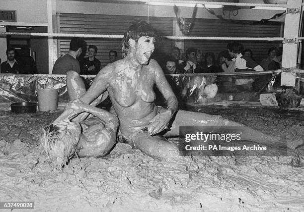 *contains adult content* Action from female mud wrestling