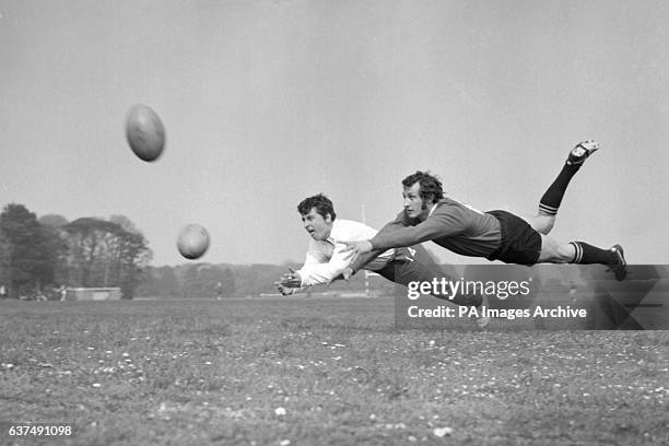 Gareth Edwards and Ray Hopkins fly through the air as the British Lions rugby team train at Eastbourne before their tour of Australia, New Zealand...