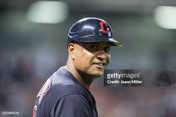 First base coach Sandy Alomar Jr. #15 of the Cleveland Indians pauses on first base during the third inning against the Detroit Tigers at Progressive...