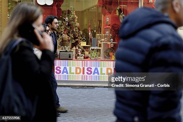 Shop window indicates "sales" in Via Frattina on January 4, 2017 in Rome, Italy. The winter sales begin in Rome tomorrow January 5th.