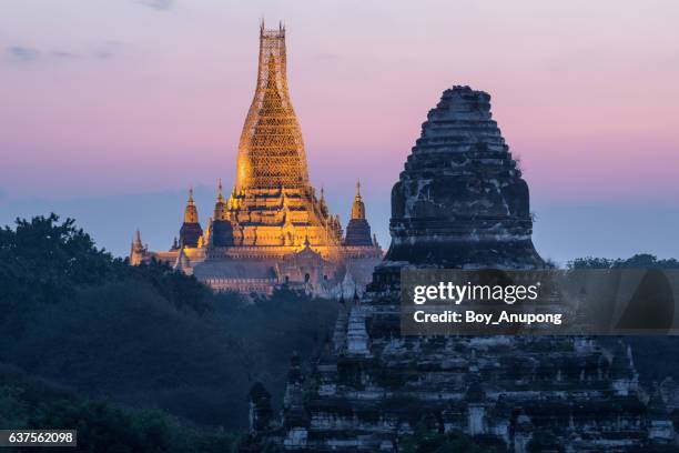 the ananda temple is one of bagan's best known and most beautiful temples under repairing from the big earthquake in 2016. - bagan temples damaged in myanmar earthquake stock pictures, royalty-free photos & images