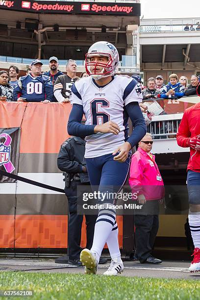 Punter Ryan Allen of the New England Patriots walks onto the field prior to the game against the Cleveland Browns at FirstEnergy Stadium on October...