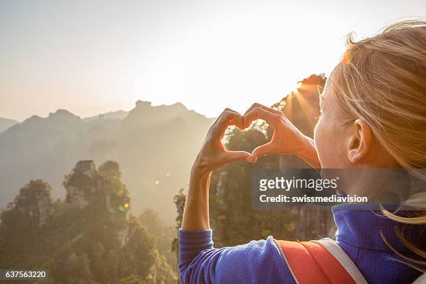 young woman loving nature - quartz sandstone stock pictures, royalty-free photos & images