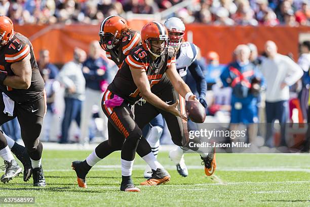 Quarterback Charlie Whitehurst of the Cleveland Browns pitches the ball during the first half against the New England Patriots at FirstEnergy Stadium...