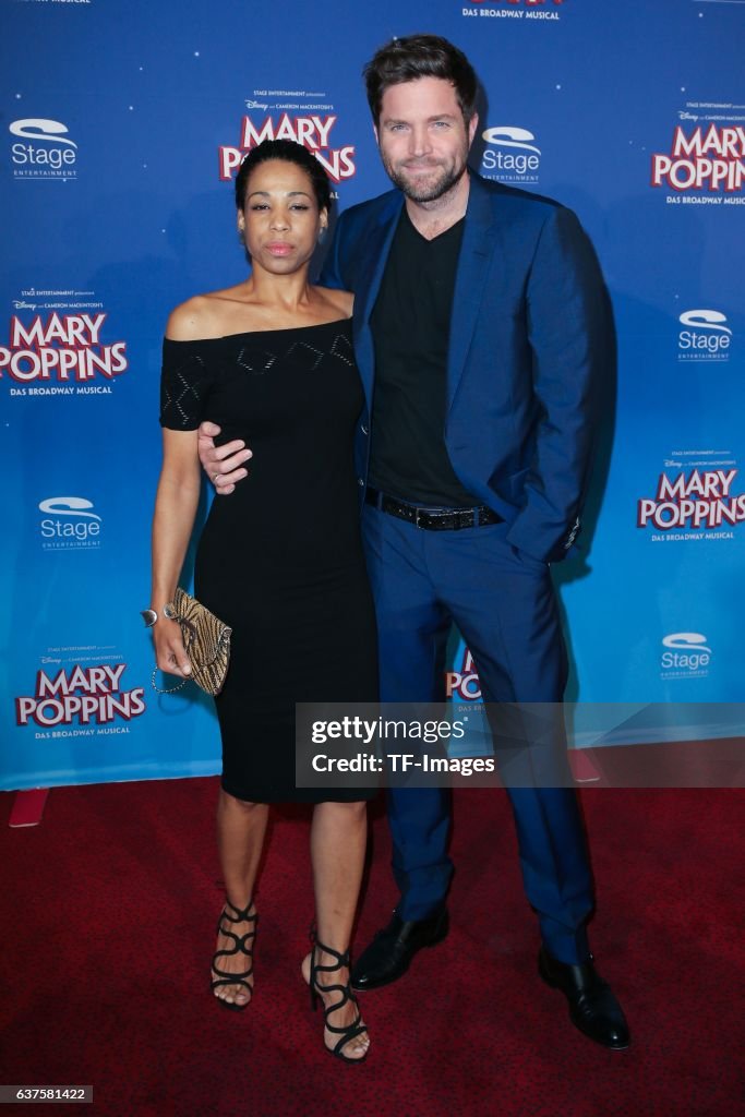 Peter Ketnath and Maykellis Ketnath attend the red carpet at the