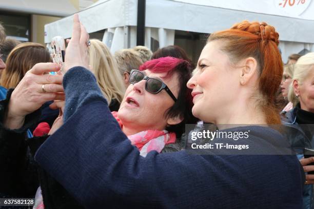 Selfie mit Fans, Enie van de Meiklokjes attend the opening of the City Outlet Geislingen on October 27, 2016 in Geislingen, Germany.