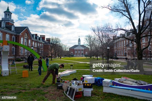 Students prepare a display for a holiday ceremony on the campus of the Johns Hopkins University in Baltimore, Maryland, December 7, 2016. .