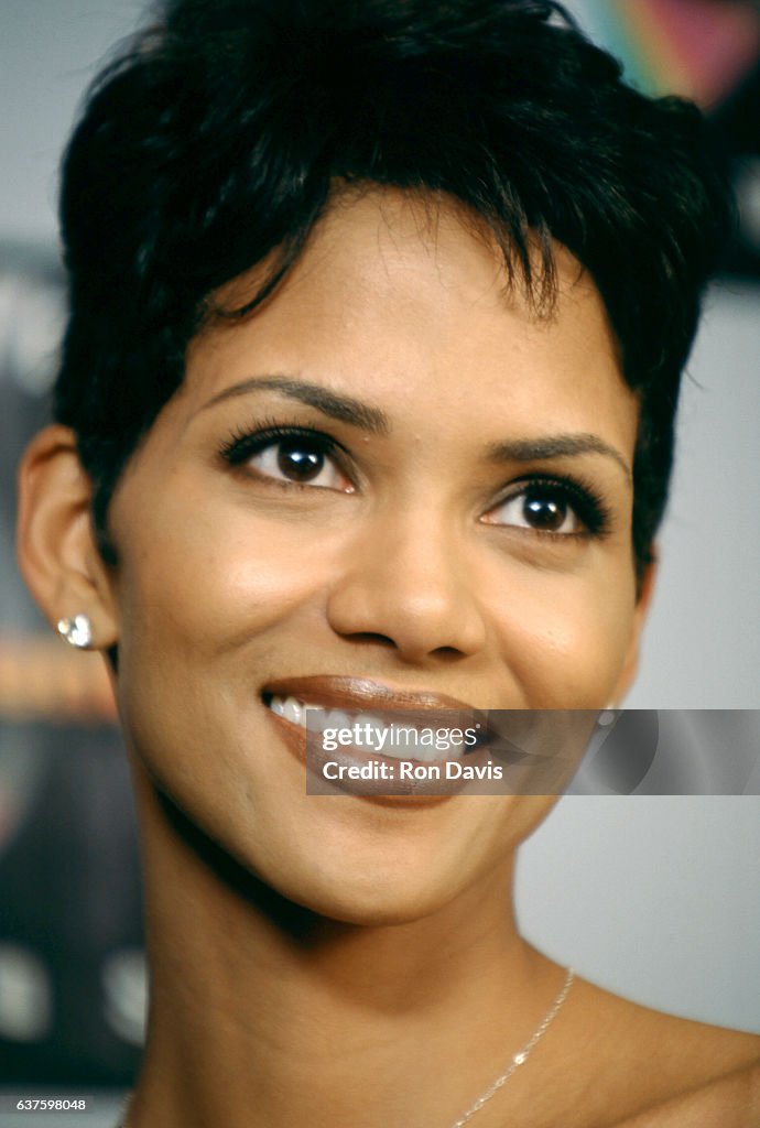 Actress Halle Berry Poses For A Portrait While She Arrives For The actress-halle-berry-poses-for-a-portrait-while-she-arrives-for-the
