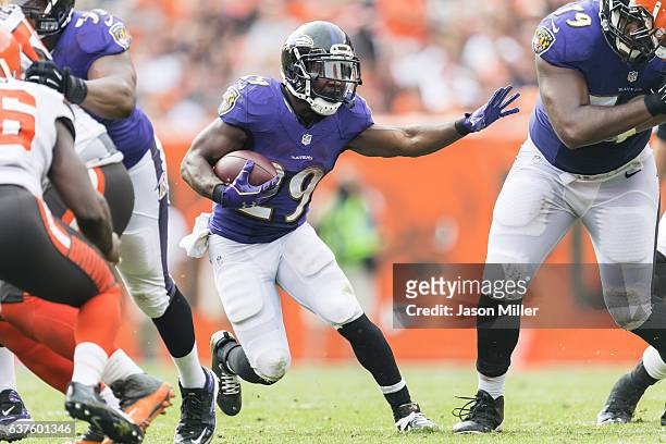 Running back Justin Forsett of the Baltimore Ravens runs for a gain during the second half against the Cleveland Browns at FirstEnergy Stadium on...