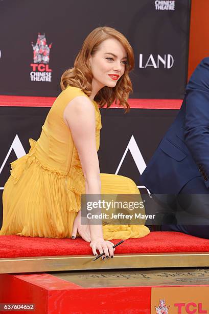 Actress Emma Stone attend the Hand And Footprint Ceremony for Ryan Gosling and Emma Stone at the TCL Chinese Theatre IMAX on December 7, 2016 in...