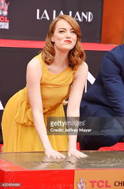 Actress Emma Stone attend the Hand And Footprint Ceremony for Ryan Gosling and Emma Stone at the TCL Chinese Theatre IMAX on December 7, 2016 in...