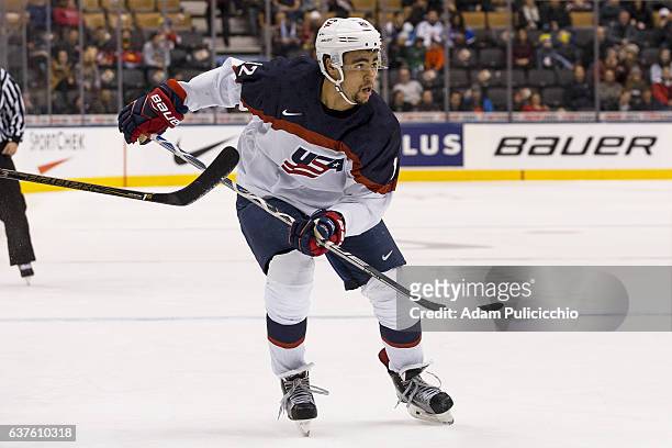 Forward Jordan Greenway of Team United States skates through the Team Slovakia defensive zone in a preliminary round - Group B game during the IIHF...