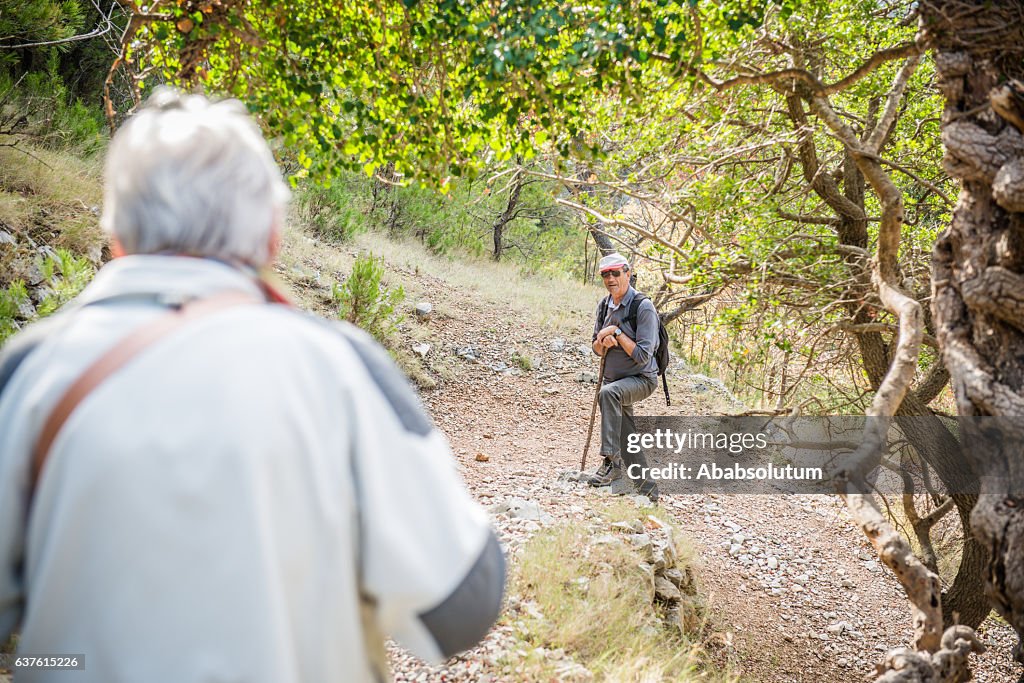 Senior Couple Hiking towards Pustinja Blaca, Brac Island, Croatia, Europe