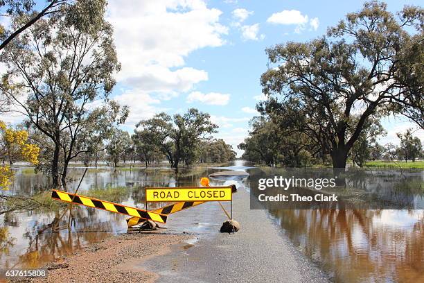 road flooded at condobolin, nsw - flood stock pictures, royalty-free photos & images