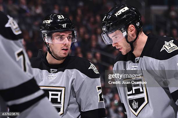 Nick Shore and Brayden McNabb of the Los Angeles Kings chat before taking a face-off during the game against the San Jose Sharks on December 31, 2016...