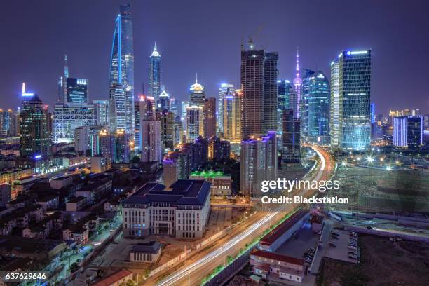 the busy lujiazui fianancail and trade zone - city night stock illustrations