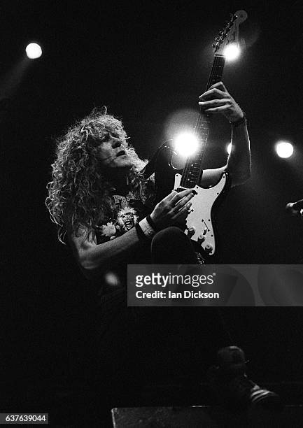 Janick Gers of Iron Maiden performing on stage at Wembley Arena, London, 18 December 1990.