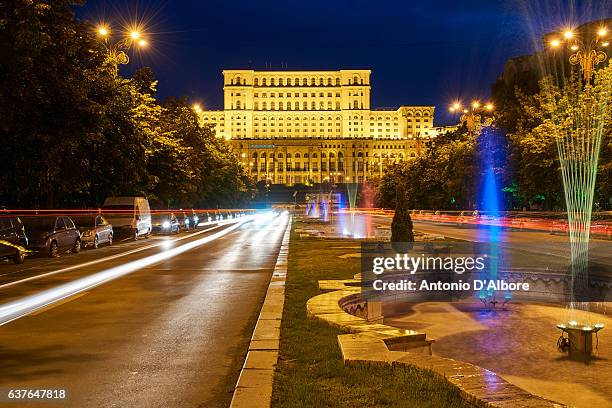 romania parliament palace by night - the palace of the parliament stock pictures, royalty-free photos & images