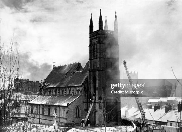 Teams of firemen fighting to save St Godric's Roman Catholic Church in Durham City from being engulfed by flames. The blaze was spotted when smoke...