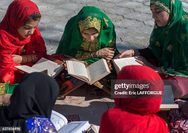 Girl madrasa students reading koran on December 29, 2015 in Bandar-e Kong, Hormozgan Province, Iran.