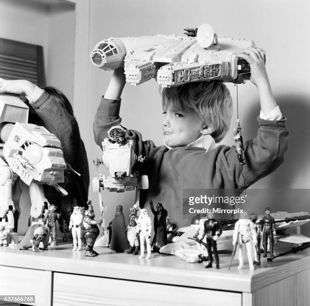 Two boys, Thomas and Robbin playing with their Star Wars toys. 16th November 1983.