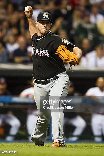 Starting pitcher Jose Fernandez of the Miami Marlins throws out Lonnie Chisenhall of the Cleveland Indians at first during the third inning during an...