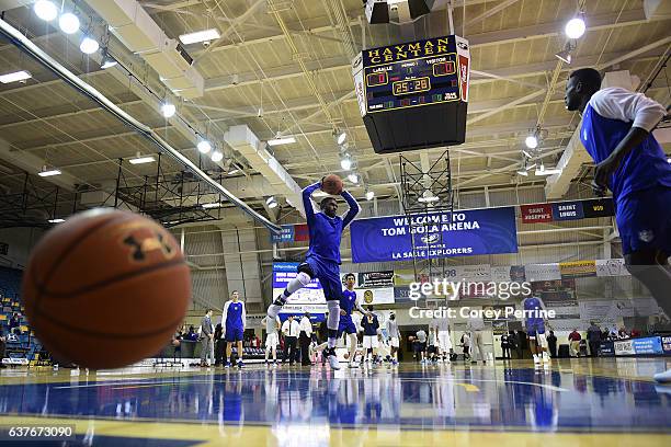 Aaron Hines of the Saint Louis Billikens looks to pass the ball while warming up before taking on the La Salle Explorers at Tom Gola Arena on January...