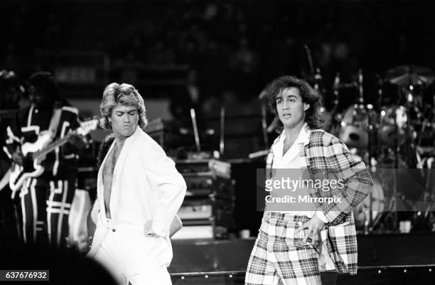 British pop group Wham pictured on their 10-day visit to China, April 1985. George Michael and Andrew Ridgeley, on stage during the band's concert at...