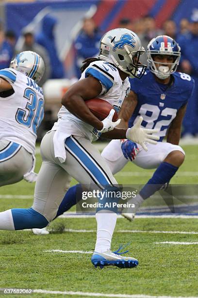 Wide Receiver Andre Roberts of the Detroit Lions has a long gain against the New York Giants during their game at MetLife Stadium on December 18,...