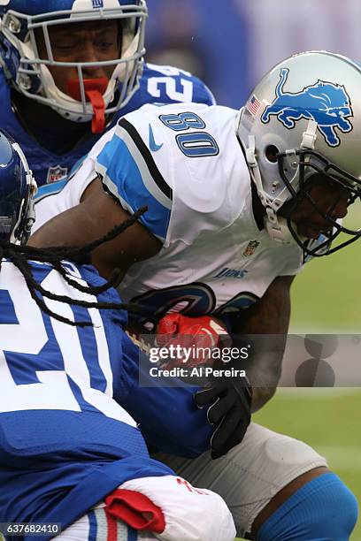 Wide Receiver Anquan Boldin of the Detroit Lions has a long gain against the New York Giants during their game at MetLife Stadium on December 18,...