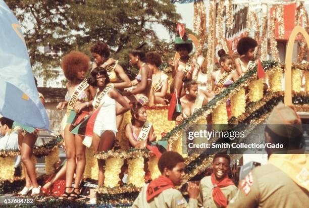 Float holding Beauty Pageant winners from around the city in the Bud Billiken Day Parade on the South Side of Chicago, Illinois, August, 1973. Image...