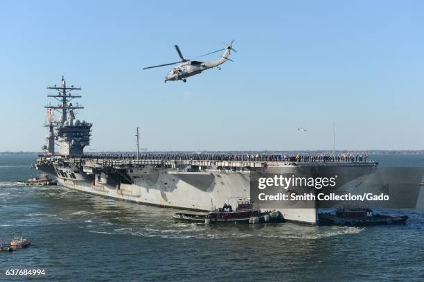 Dwight D Eisenhower makes its approach pier side at Naval Station Norfolk after a six-month deployment to the United States 5th and 6th fleet areas...