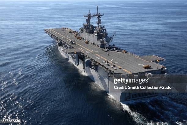 The amphibious assault ship USS Kearsarge is underway conducting sea trials in preparation for a scheduled deployment, January 19, 2013. Image...