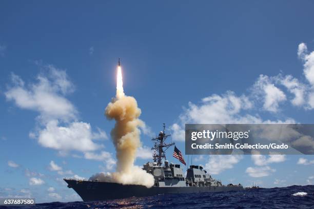 Guided-missile destroyer USS Fitzgerald fires a Standard Missile-3 during a joint ballistic missile defense exercise, Pacific Ocean, 2012. Image...