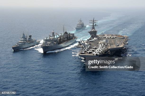 Guided-missile cruiser USS Hue City , the German navy frigate FGS Hamburd , the aircraft carrier USS Dwight D. Eisenhower , and the Military Sealift...