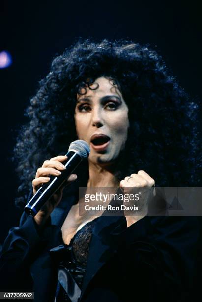 Singer and actress Cher performs on stage at the Mirage Hotel and Casino circa February, 1992 in Las Vegas, Nevada.